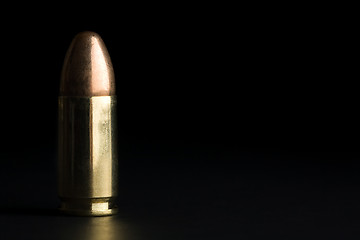 Image showing bullet on black