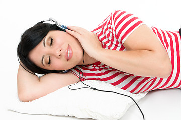 Image showing Woman resting with favourite music