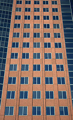 Image showing Windows of a terracotta-colored building