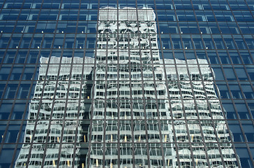 Image showing Reflection of a white office building