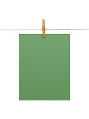 Image showing Green paper sheet on a clothes line (+2 clipping paths)