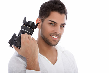 Image showing Handsome young photographer holding a camera