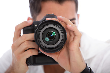 Image showing Male photographer taking a photograph