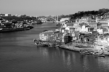 Image showing Portugal. Porto city. View of Douro river embankment  in black a