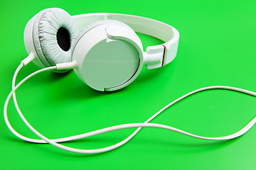 Image showing Headphone on green background