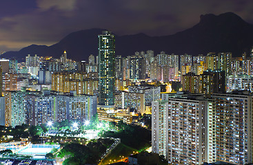 Image showing Kowloon area in Hong Kong at night with lion rock