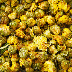 Image showing Heap of dried chamomile flower