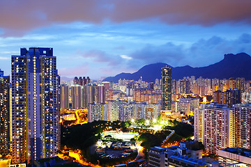 Image showing Kowloon side in Hong Kong at night with lion rock