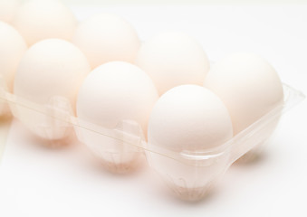 Image showing White egg in plastic container
