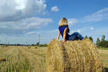 Image showing young blond woman girl teen sit straw bale 