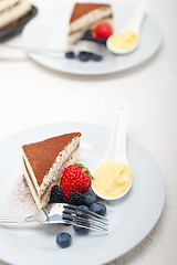 Image showing tiramisu dessert with berries and cream