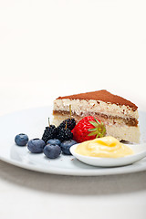 Image showing tiramisu dessert with berries and cream