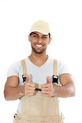 Image showing Handsome handyman giving a thumbs up