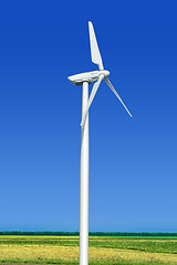 Image showing green meadow with wind turbine