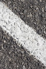 Image showing Asphalt pavement with white marking strip