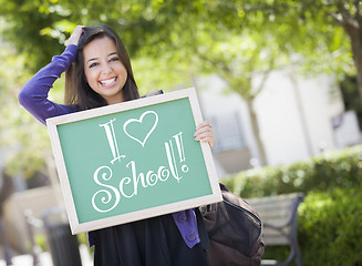 Image showing Mixed Race Female Student Holding Chalkboard With I Love School