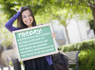 Image showing Mixed Race Female Student Holding Chalkboard With Theory and Def