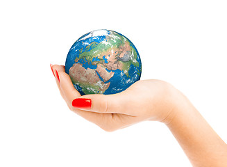 Image showing Hand of the person holds globe.