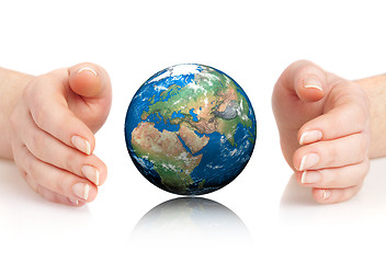 Image showing Hand of the person holds globe.