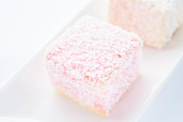 Image showing Lamington sponge cakes on the plate