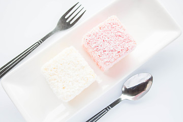 Image showing Pink and white lamington sponge cakes 