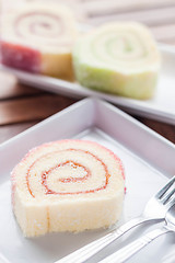 Image showing Colorful jam rolls served in restaurant