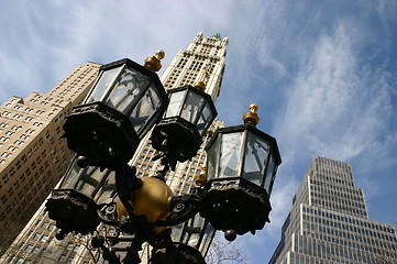 Image showing Tall buildings & street light in New York Manhattan
