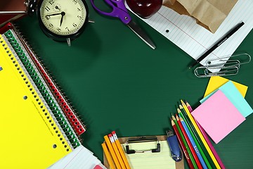 Image showing Back to School Items Arranged on a Green Blackboard