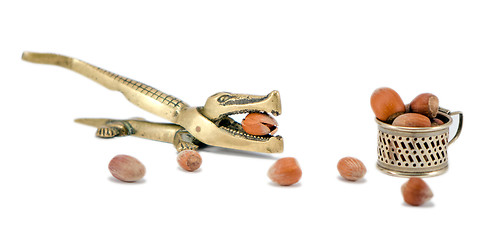Image showing brass nut crack crush tool cobnut isolated white 