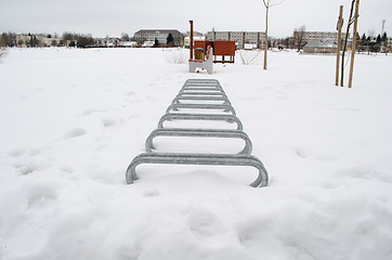 Image showing bicicle parking place snow park lake beach winter 