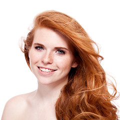 Image showing beautiful young redhead woman with freckles portrait