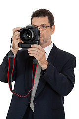 Image showing adult man photographer with digital camera dslr isolated