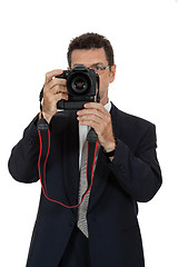 Image showing adult man photographer with digital camera dslr isolated