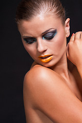 Image showing woman with extreme colorfull make up in blue and yellow