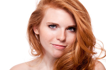 Image showing beautiful young smiling woman with red hair and freckles isolated