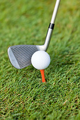 Image showing golf ball and iron on green grass detail macro summer outdoor