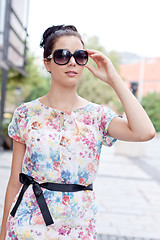 Image showing attractive woman with sunglasses in the city summertime