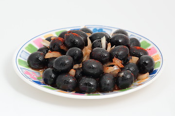 Image showing black olives seasoned