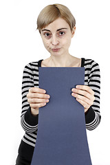 Image showing Woman holding a paper