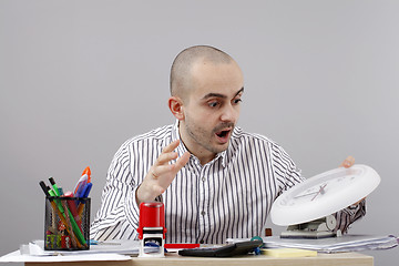 Image showing Man at desk