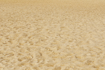 Image showing yellow sea sand with footprints