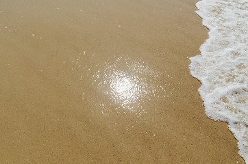 Image showing sun reflection in sand on the beach