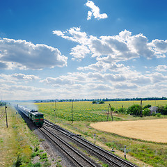 Image showing old locomotive with train on railroad