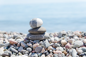 Image showing stack of zen stones on beach