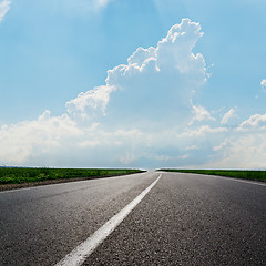 Image showing asphalt road to horizon under cloudy sky