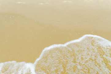 Image showing sand with white foam