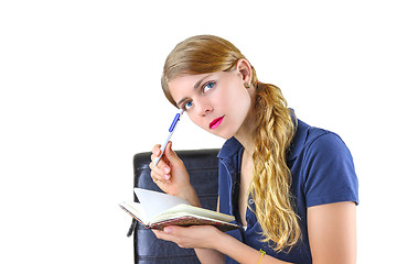 Image showing Woman preparing a list