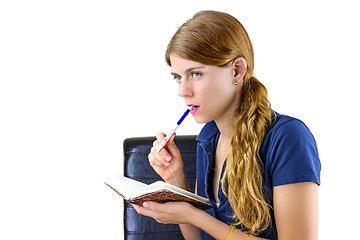 Image showing Woman preparing a list