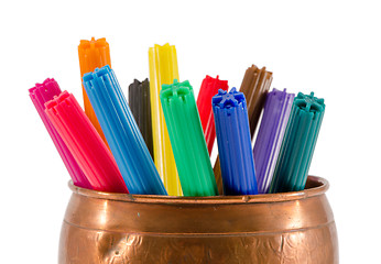 Image showing copper box full of colorful felt-tip pens on white 