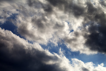 Image showing Blue sky with dark clouds